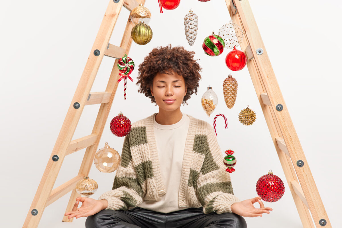 dark-skinned-woman-sits-lotus-pose-keeps-eyes-closed-breathes-deeply-has-meditation-exercise-tries-relax-tranquil-atmosphere-poses-1200x800.jpg